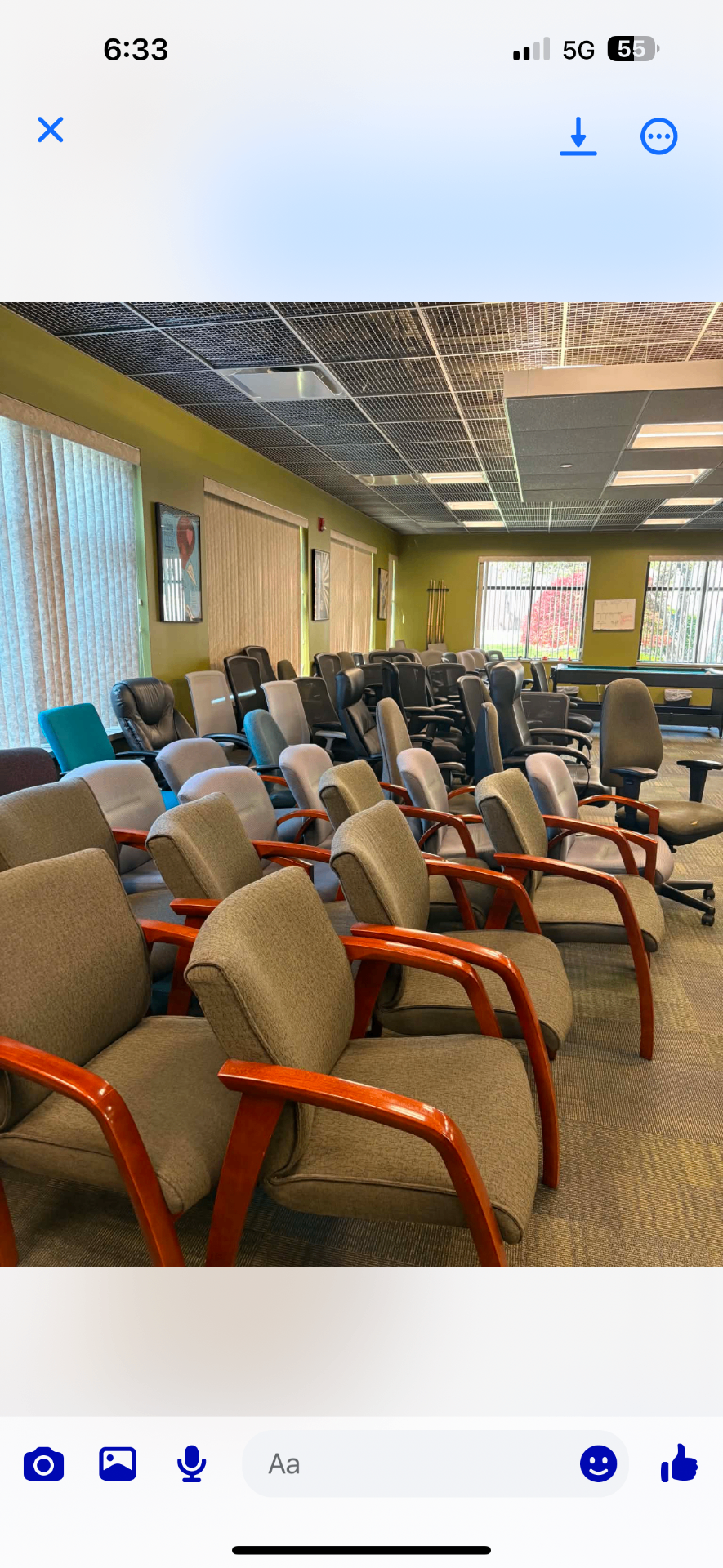 Rows of used office chairs ready for removal during a Cleveland office cleanout by The Best Junk Removal